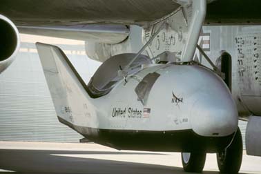 X-38 V-131R under the wing of Boeing NB-52B Stratofortress, 52-0008 on the flightline at Edwards AFB