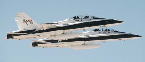 NASA Boeing-McDonnell-Douglas F/A-18B Hornets, N852NA and N846NA take off from runway 22 at Edwards AFB