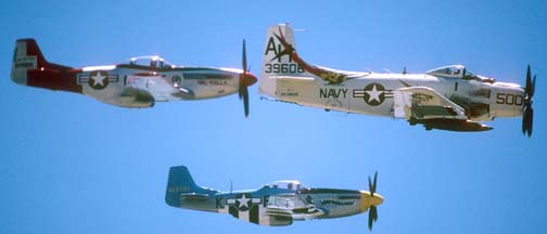 Douglas A-1H, NX39606; North American P-51D, N151AF; and P-51D, N2580