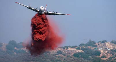 Tankers fight the Camino Fire on the crest of the Santa Ynez Mountains, August 15, 2002