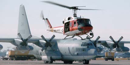 Base search and rescue Bell HH-1N Huey, 158554 and Lockheed KC-130T Hercules, 164999 of VMGR-234