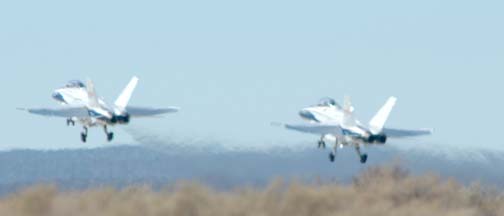 NASA McDonnell-Douglas F/A-18B Hornet chase planes take-off