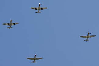 North American P-51D Mustang NL5441V Spam Can, P-51D Mustang NL7715C Wee Willy II, P-51D Mustang N151MW Lady Alice, and P-51D Mustang NL50FS La Pisolera
