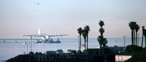 Howard Hughes' Flying Boat is barged to its new hangar