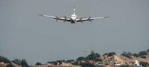 Tankers fight the Camino Fire on the crest of the Santa Ynez Mountains, August 15, 2002